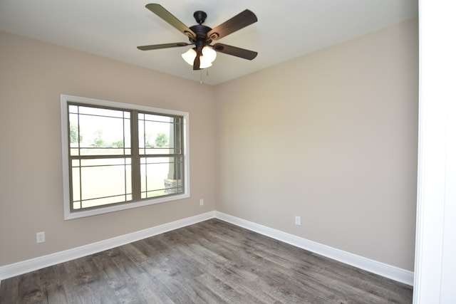5120 Judge Logue Rd, Newton, AL 36352 - empty room featuring dark wood-style flooring and ceiling fan