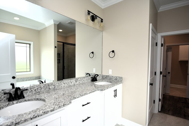 5120 Judge Logue Rd, Newton, AL 36352 - full bathroom with crown molding, double vanity, a shower stall, recessed lighting, and tile patterned flooring