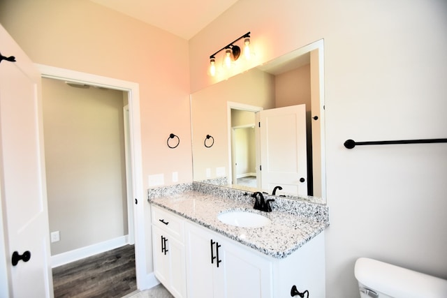 5120 Judge Logue Rd, Newton, AL 36352 - bathroom featuring vanity and wood finished floors