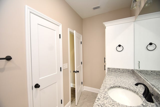 5120 Judge Logue Rd, Newton, AL 36352 - bathroom featuring vanity and tile patterned floors