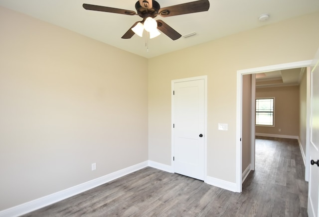 5120 Judge Logue Rd, Newton, AL 36352 - unfurnished bedroom featuring wood finished floors and a ceiling fan
