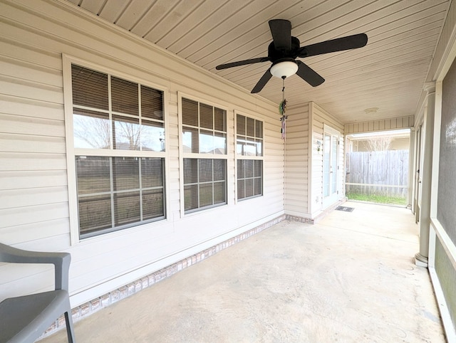 view of patio featuring ceiling fan