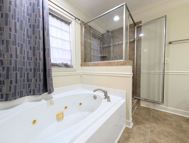 bathroom with ornamental molding, a stall shower, a jetted tub, and tile patterned floors