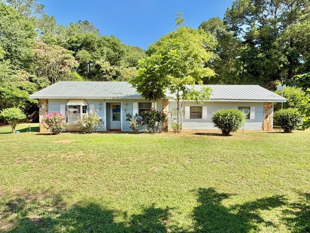 4955 County Road 36, Hartford, AL 36344 - ranch-style house with metal roof and a front yard