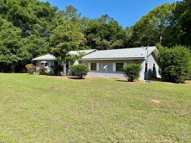 4955 County Road 36, Hartford, AL 36344 - single story home with a front yard and metal roof