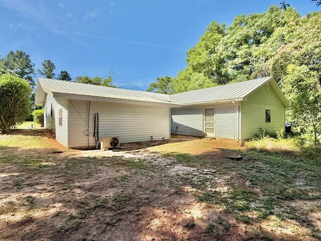 4955 County Road 36, Hartford, AL 36344 - rear view of house with metal roof