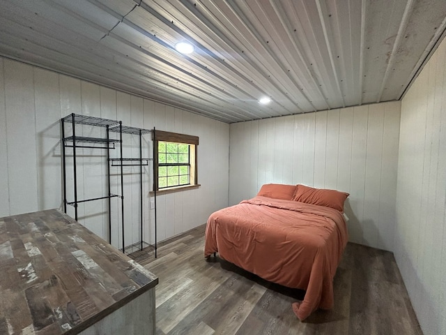 489 Skipper Rd, Malvern, AL 36375 - bedroom with wood walls and wood finished floors