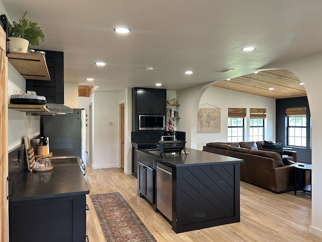 489 Skipper Rd, Malvern, AL 36375 - kitchen featuring recessed lighting, open shelves, arched walkways, and dark countertops