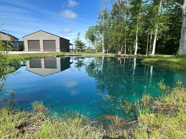 489 Skipper Rd, Malvern, AL 36375 - view of swimming pool featuring an outbuilding and a water view