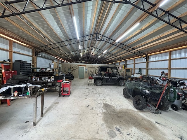 489 Skipper Rd, Malvern, AL 36375 - garage with a workshop area and metal wall