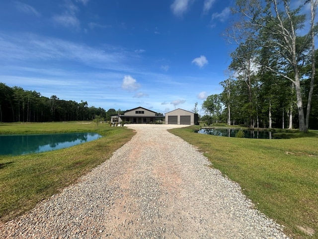 489 Skipper Rd, Malvern, AL 36375 - view of road with a water view and gravel driveway