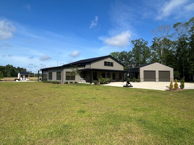 489 Skipper Rd, Malvern, AL 36375 - view of front of home featuring an attached garage, driveway, and a front yard