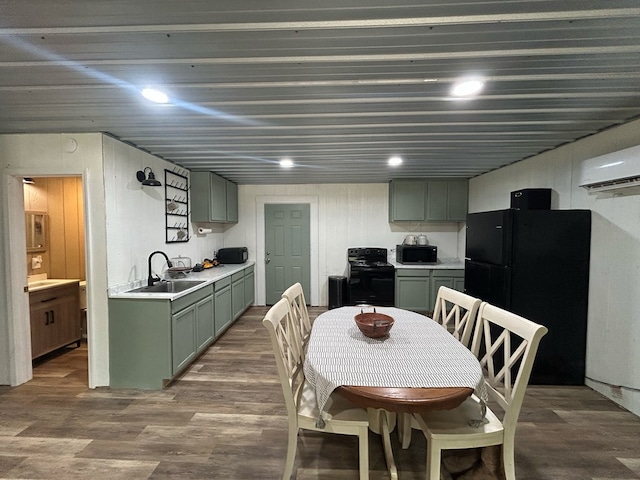 489 Skipper Rd, Malvern, AL 36375 - dining space featuring an AC wall unit, recessed lighting, and wood finished floors