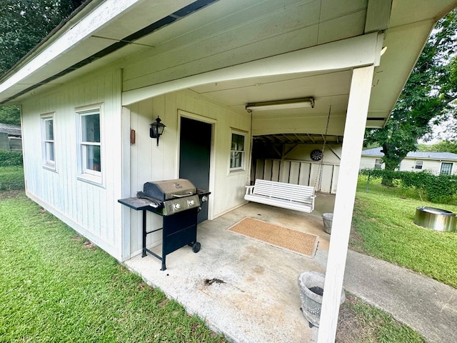 view of patio with a grill