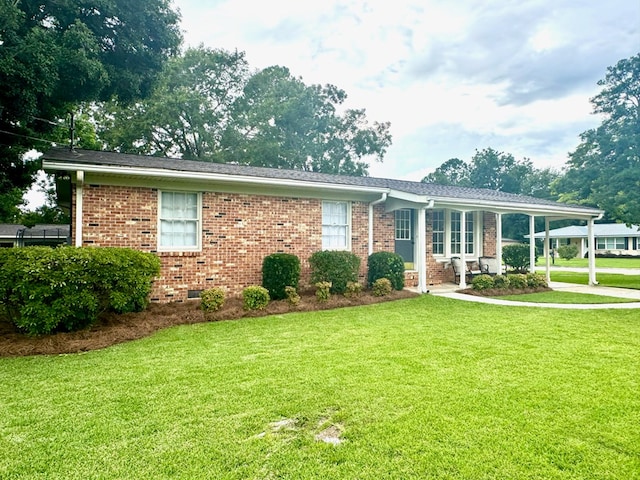 ranch-style house with a front yard