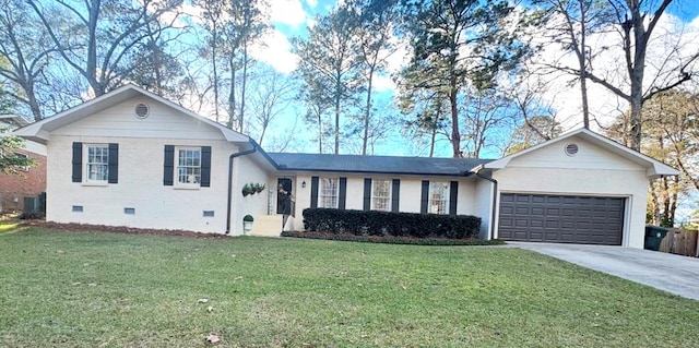 view of front of house with a garage and a front lawn