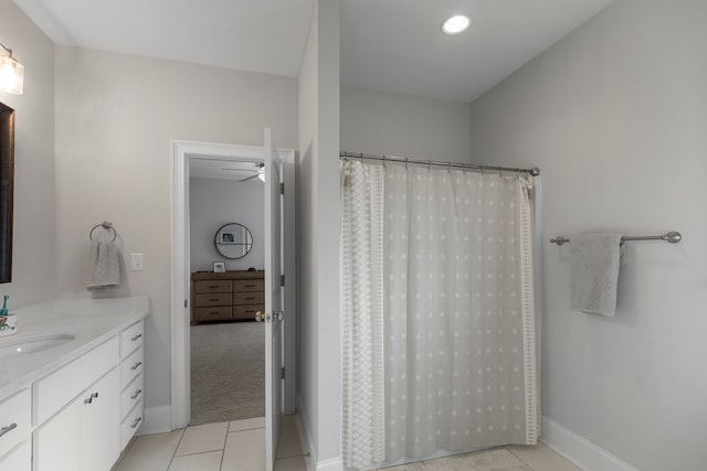 652 Charleston Mills Dr, Dothan, AL 36350 - full bath with vanity, baseboards, curtained shower, tile patterned flooring, and ceiling fan