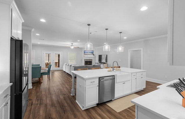 652 Charleston Mills Dr, Dothan, AL 36350 - kitchen with freestanding refrigerator, dark wood finished floors, a kitchen island with sink, dishwasher, and a sink