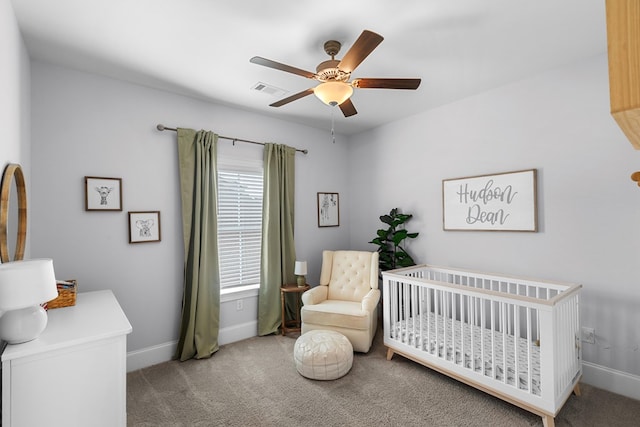 652 Charleston Mills Dr, Dothan, AL 36350 - bedroom featuring a nursery area, baseboards, and carpet flooring