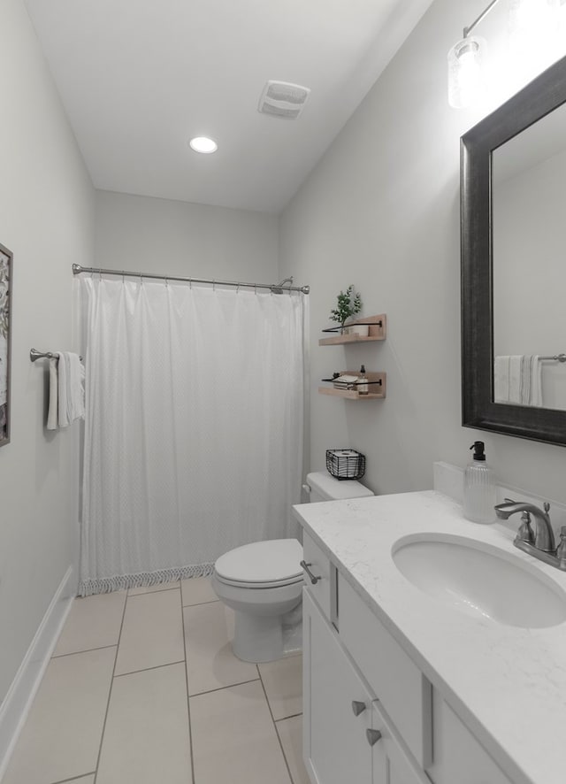 652 Charleston Mills Dr, Dothan, AL 36350 - full bathroom featuring visible vents, a shower with curtain, toilet, vanity, and tile patterned floors