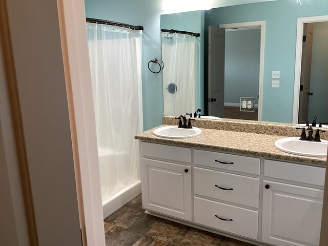 116 Jules Ln, Ashford, AL 36312 - bathroom with double vanity and a shower with curtain