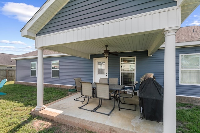 view of patio / terrace featuring grilling area, fence, and ceiling fan