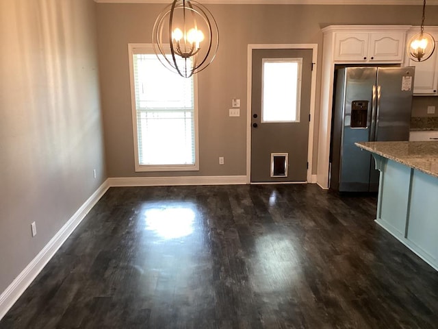 116 Jules Ln, Ashford, AL 36312 - unfurnished dining area with a chandelier, healthy amount of natural light, and dark wood-style flooring