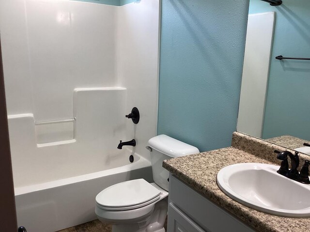 116 Jules Ln, Ashford, AL 36312 - bathroom featuring vanity, toilet, and bathtub / shower combination