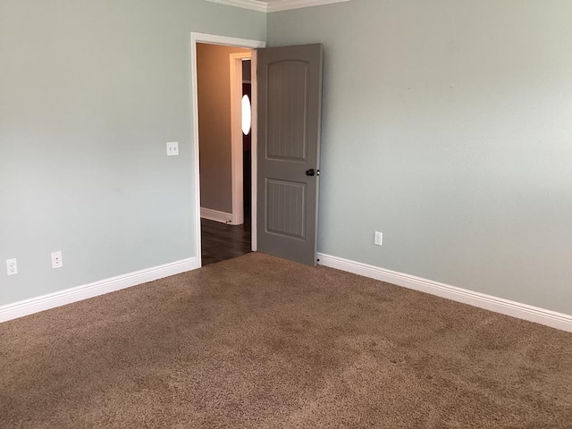 116 Jules Ln, Ashford, AL 36312 - unfurnished room with carpet, baseboards, and crown molding