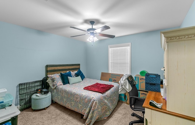 bedroom featuring ceiling fan and carpet