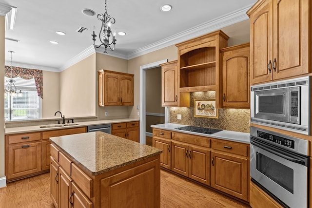 601 Edinburgh Way, Dothan, AL 36305 - kitchen with appliances with stainless steel finishes, a chandelier, a sink, light wood finished floors, and recessed lighting