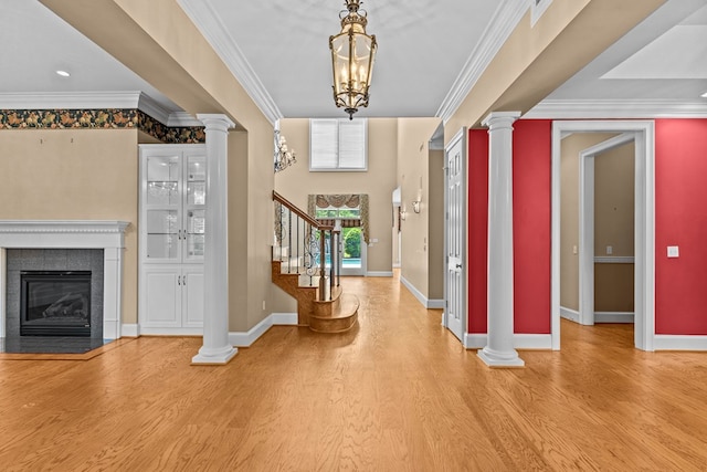 601 Edinburgh Way, Dothan, AL 36305 - foyer featuring wood finished floors, ornate columns, stairs, baseboards, and crown molding