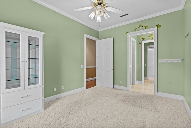 601 Edinburgh Way, Dothan, AL 36305 - unfurnished bedroom with carpet floors, crown molding, baseboards, and a ceiling fan