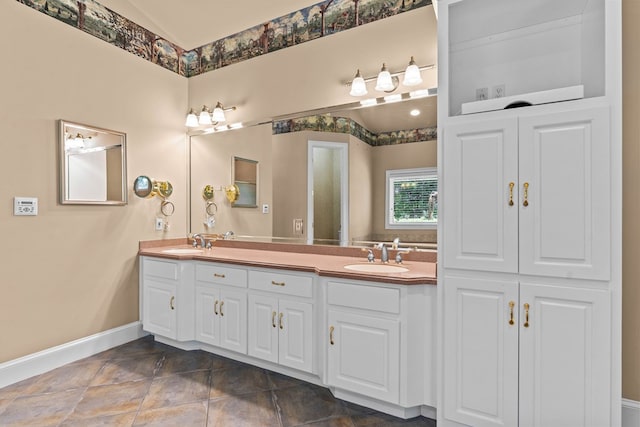 601 Edinburgh Way, Dothan, AL 36305 - bathroom featuring double vanity and baseboards