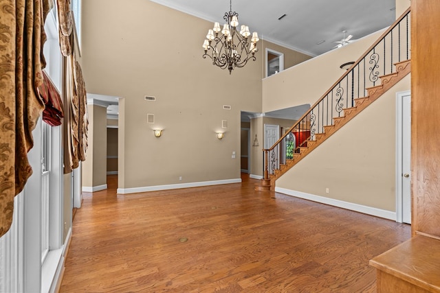 601 Edinburgh Way, Dothan, AL 36305 - foyer entrance with crown molding, a ceiling fan, stairway, wood finished floors, and baseboards