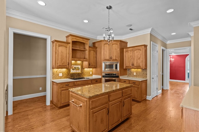 601 Edinburgh Way, Dothan, AL 36305 - kitchen featuring appliances with stainless steel finishes, a center island, light wood-style flooring, recessed lighting, and baseboards