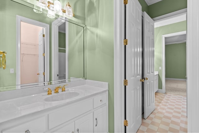 601 Edinburgh Way, Dothan, AL 36305 - bathroom with vanity, tile patterned floors, and a walk in closet