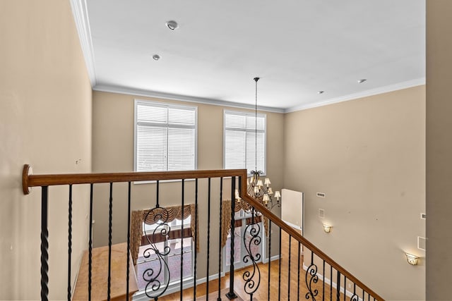 601 Edinburgh Way, Dothan, AL 36305 - corridor with crown molding, an upstairs landing, a chandelier, and wood finished floors