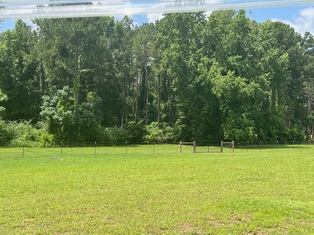 1015 Hardy Rd, Dothan, AL 36301 - view of yard with a view of trees