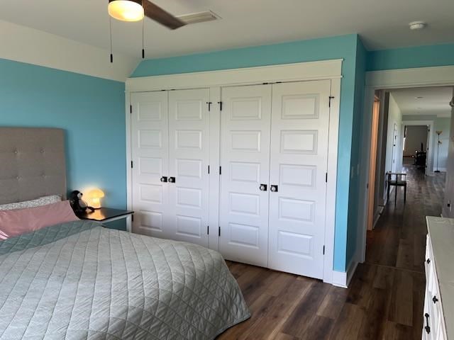 1015 Hardy Rd, Dothan, AL 36301 - bedroom featuring a closet, dark wood-style flooring, and ceiling fan