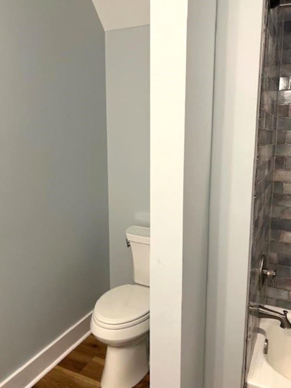 1015 Hardy Rd, Dothan, AL 36301 - bathroom featuring toilet and wood finished floors