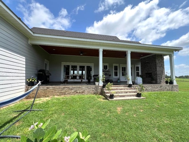1015 Hardy Rd, Dothan, AL 36301 - back of house with a patio and a yard
