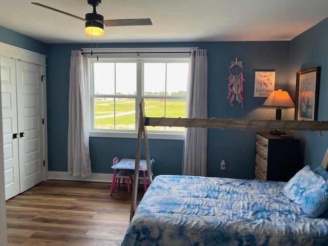 1015 Hardy Rd, Dothan, AL 36301 - bedroom featuring multiple windows, wood finished floors, and ceiling fan