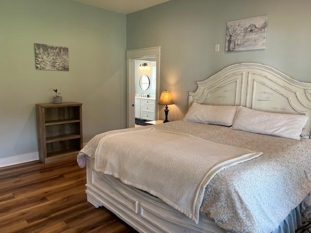 1015 Hardy Rd, Dothan, AL 36301 - bedroom with wood finished floors and baseboards