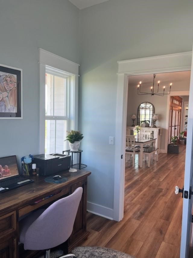 1015 Hardy Rd, Dothan, AL 36301 - office featuring dark wood-type flooring and a chandelier