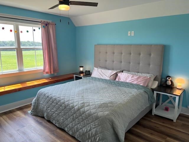 1015 Hardy Rd, Dothan, AL 36301 - bedroom with wood finished floors, vaulted ceiling, and a ceiling fan