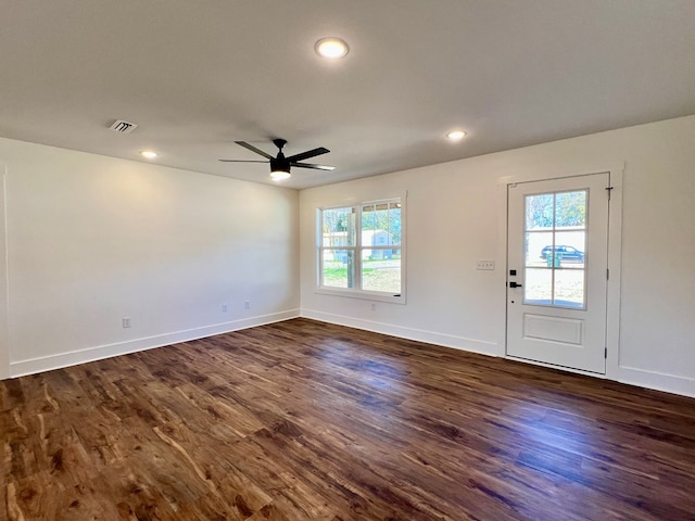 interior space featuring dark hardwood / wood-style floors and ceiling fan