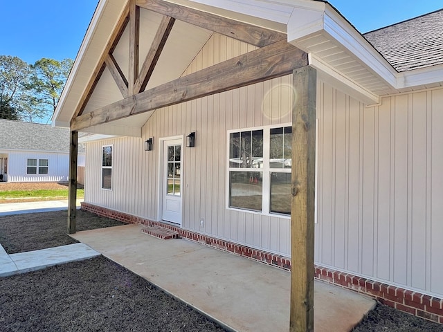 entrance to property with a patio