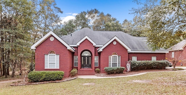 view of front of house with a front lawn