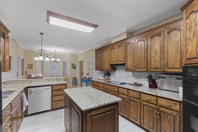 kitchen featuring black appliances, a notable chandelier, kitchen peninsula, and crown molding